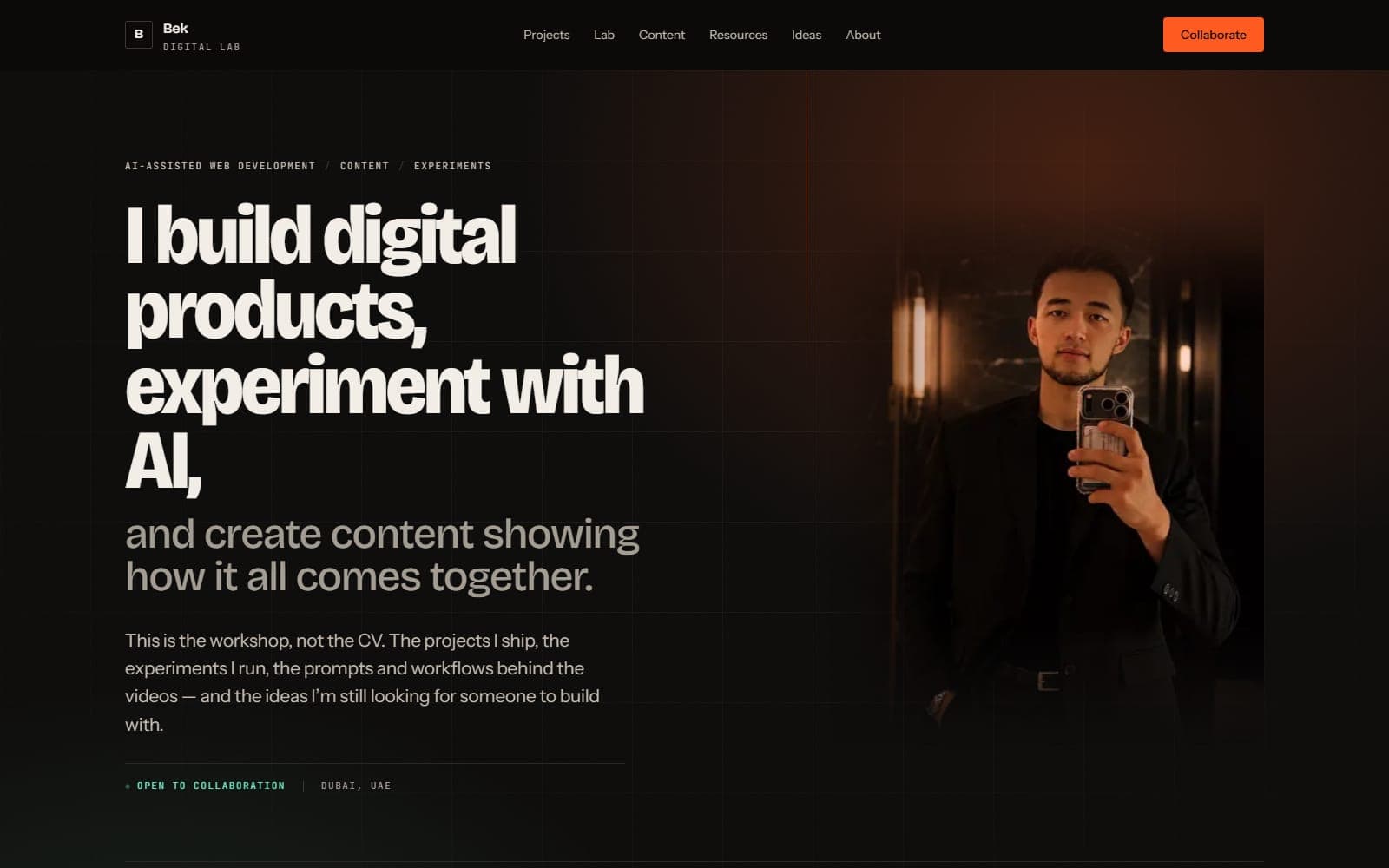 The homepage of this site, a bold condensed headline on a warm near-black ground, with a portrait edge-faded into the background on the right